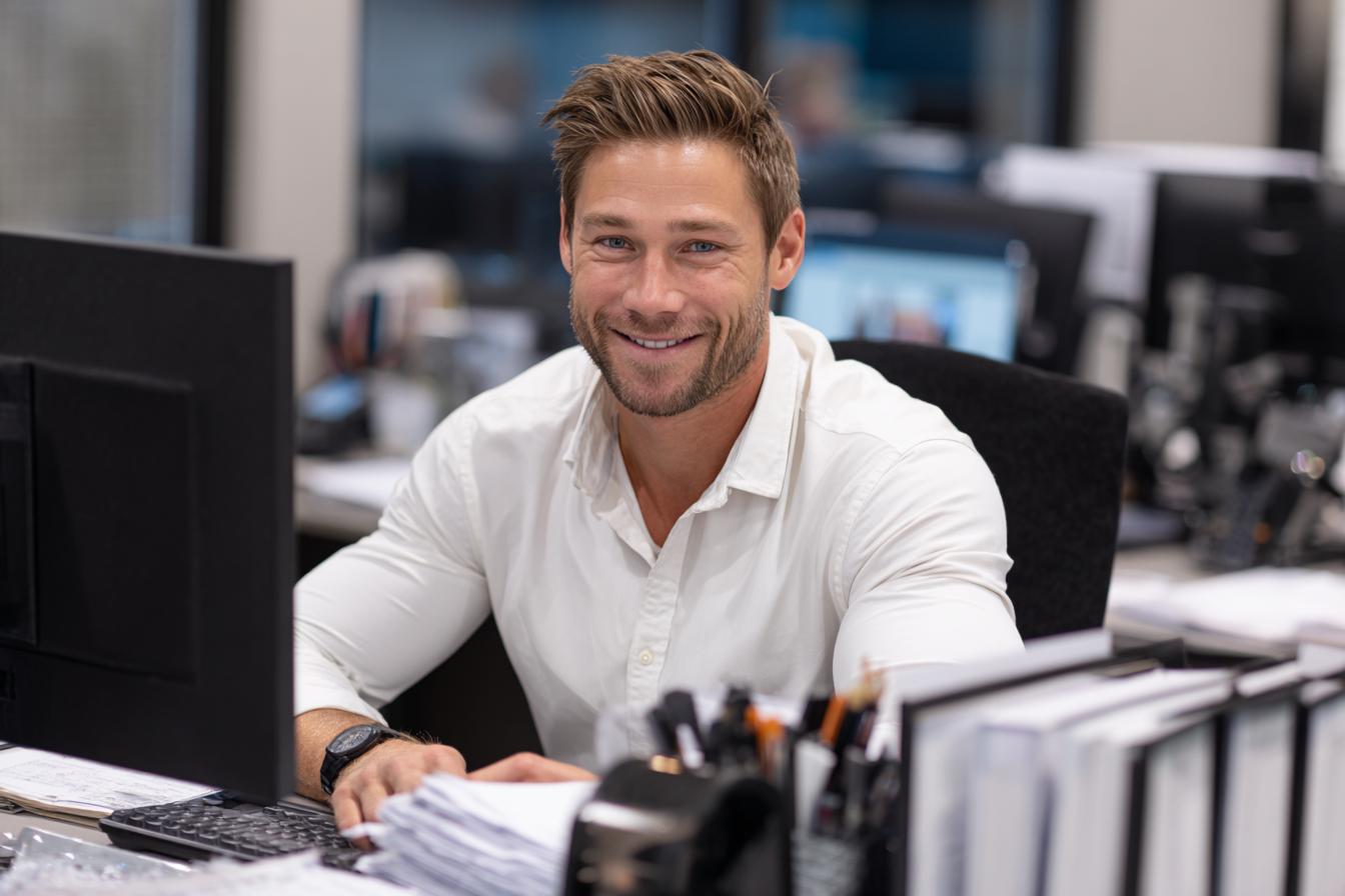 An SMSF administrator efficiently managing compliance paperwork for a client's fund.